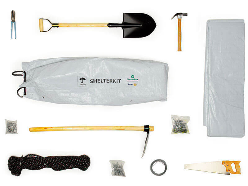 ShelterKit consisting of ropes, tarpaulins, hammer and nails